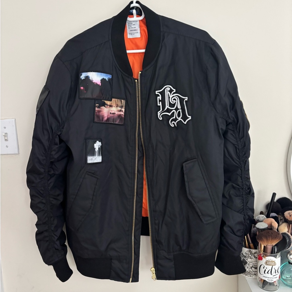 Divided Black Bomber Jacket with Graphic Patches